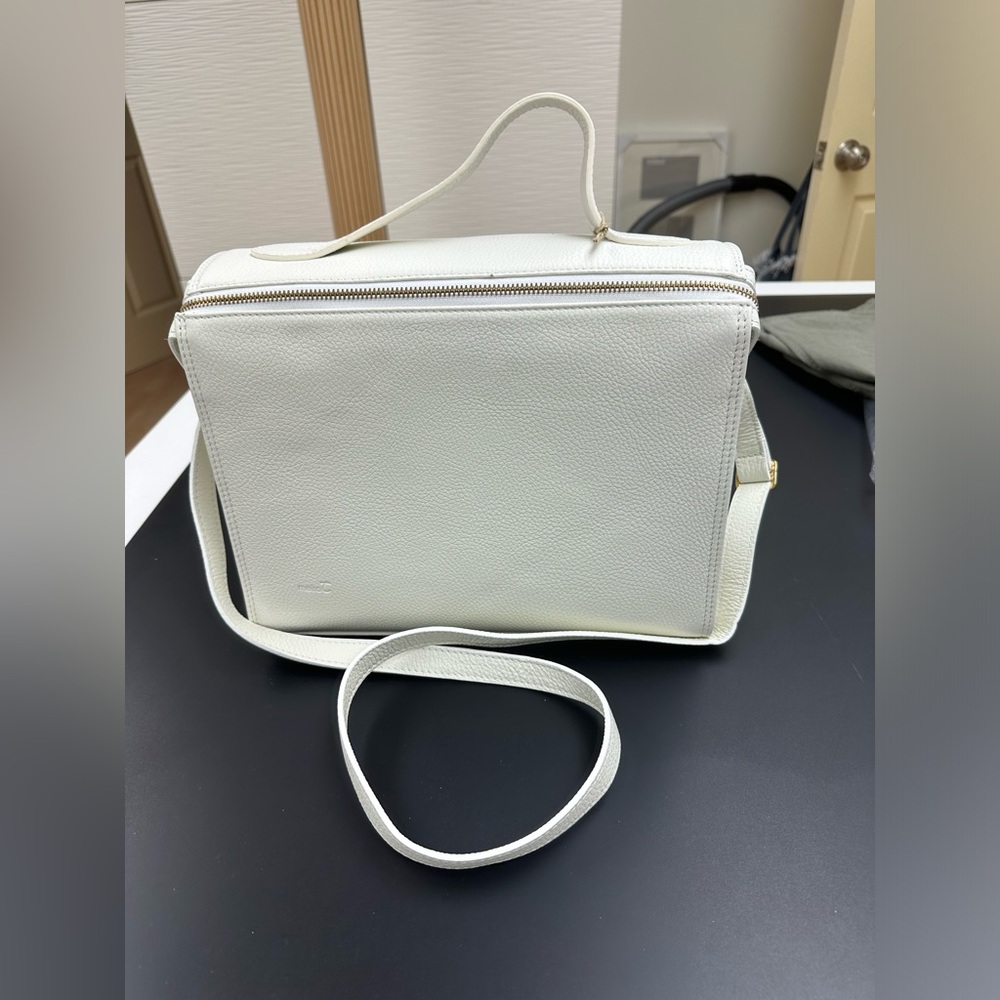 Brand: MeiraT. Designed in New York, made in Portugal. White. New with tags.